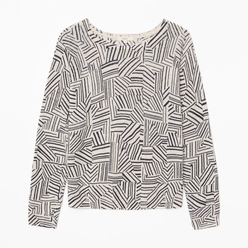 long sleeved soft top featuring a navy and off white geometric all over pattern. 