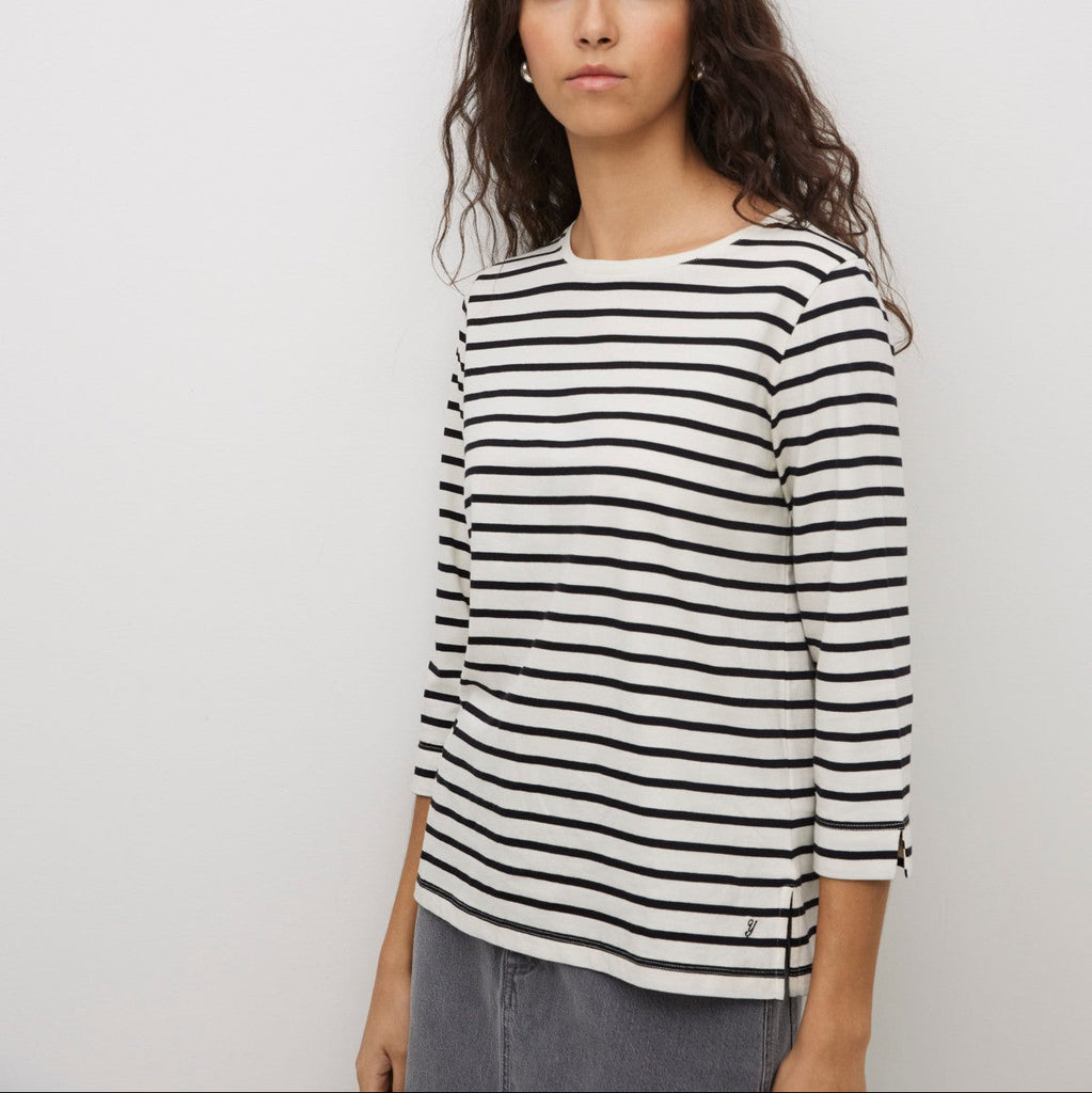 Organic cotton straight cut stripe black and white top with Bateau neckline and
Three-quarter sleeves